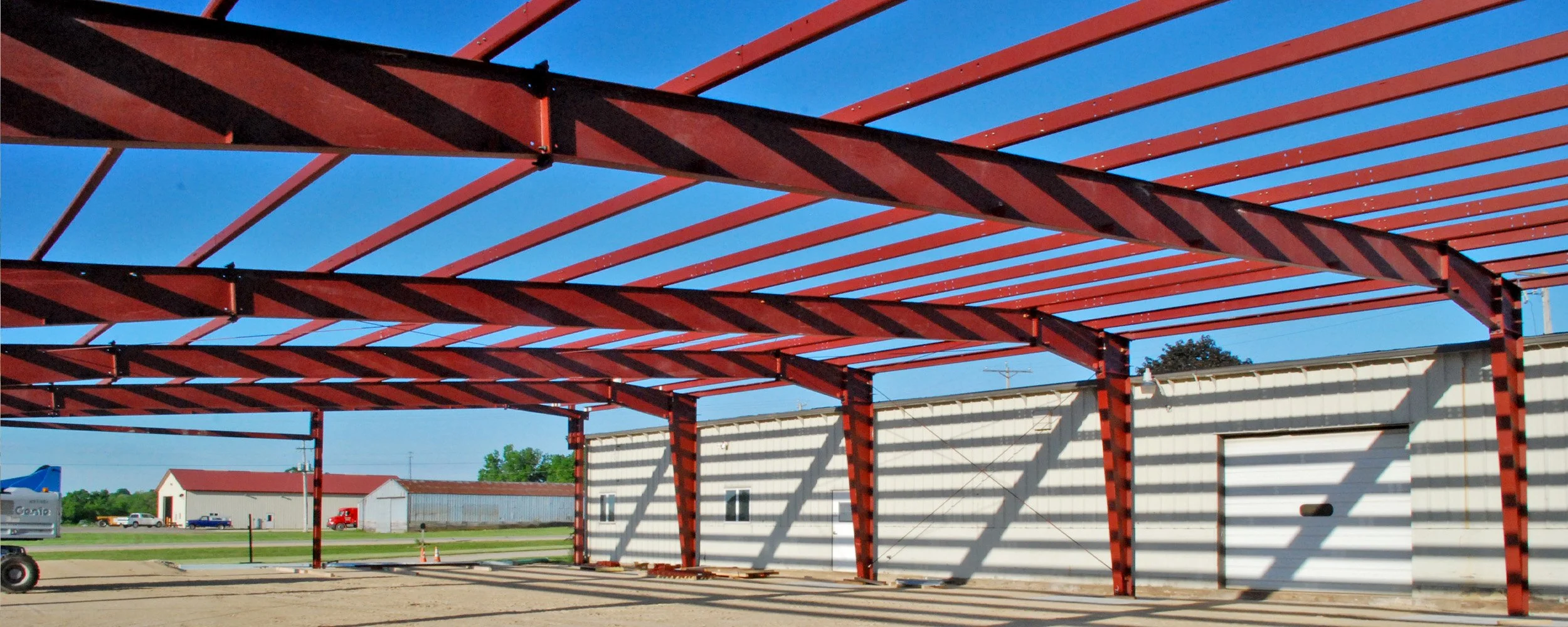 Red iron steel building frame in Beaumont Texas